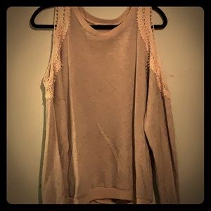 Sweater with shoulder cutouts